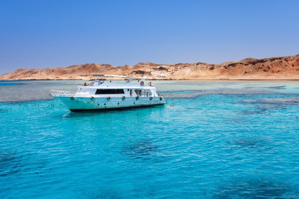 Tourist,Cruise,Boat,With,Tourists,In,Red,Sea,Next,To